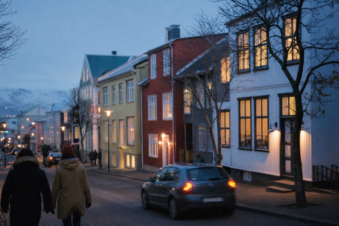 Reykjavik old town hotels glowing at dusk, the base most Golden Circle day tours pick up from