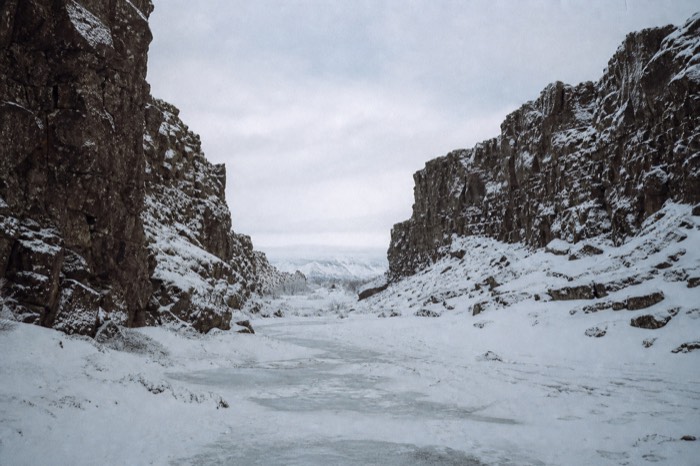 Snow-dusted Almannagja rift canyon at Thingvellir, a Game of Thrones filming landscape in Iceland