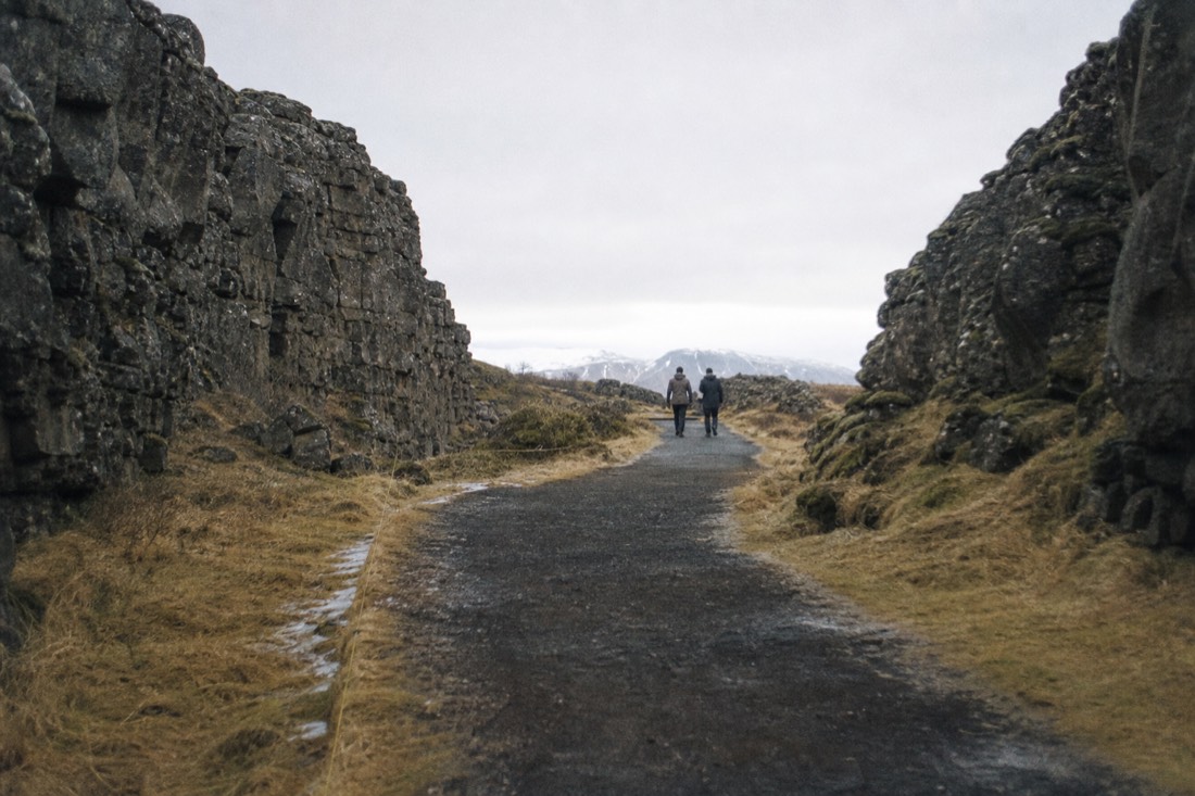 Walking path through the Almannagja rift at Thingvellir National Park between the North American and Eurasian plates